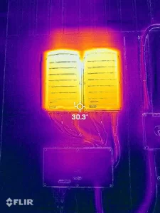 FLIR thermal image of two SolarEdge inverters during a service check